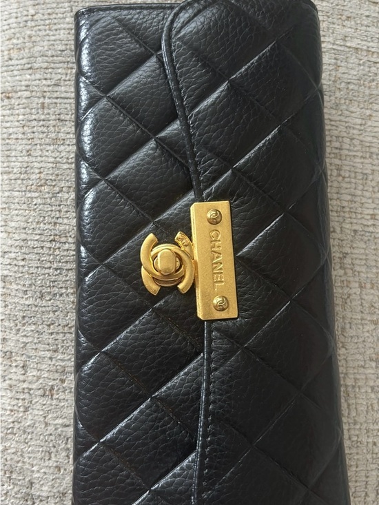 CHANEL Handbags - CHANEL Black Quilted Leather Wallet with Gold CC Plaque